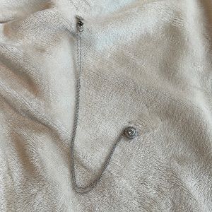 Banana Republic silver tone necklace with rhinestone pendant.